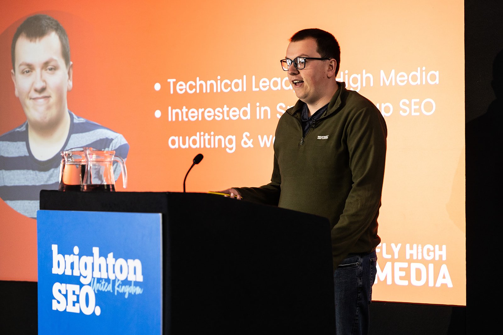 Jonathon Roberts presenting on stage at BrightonSEO