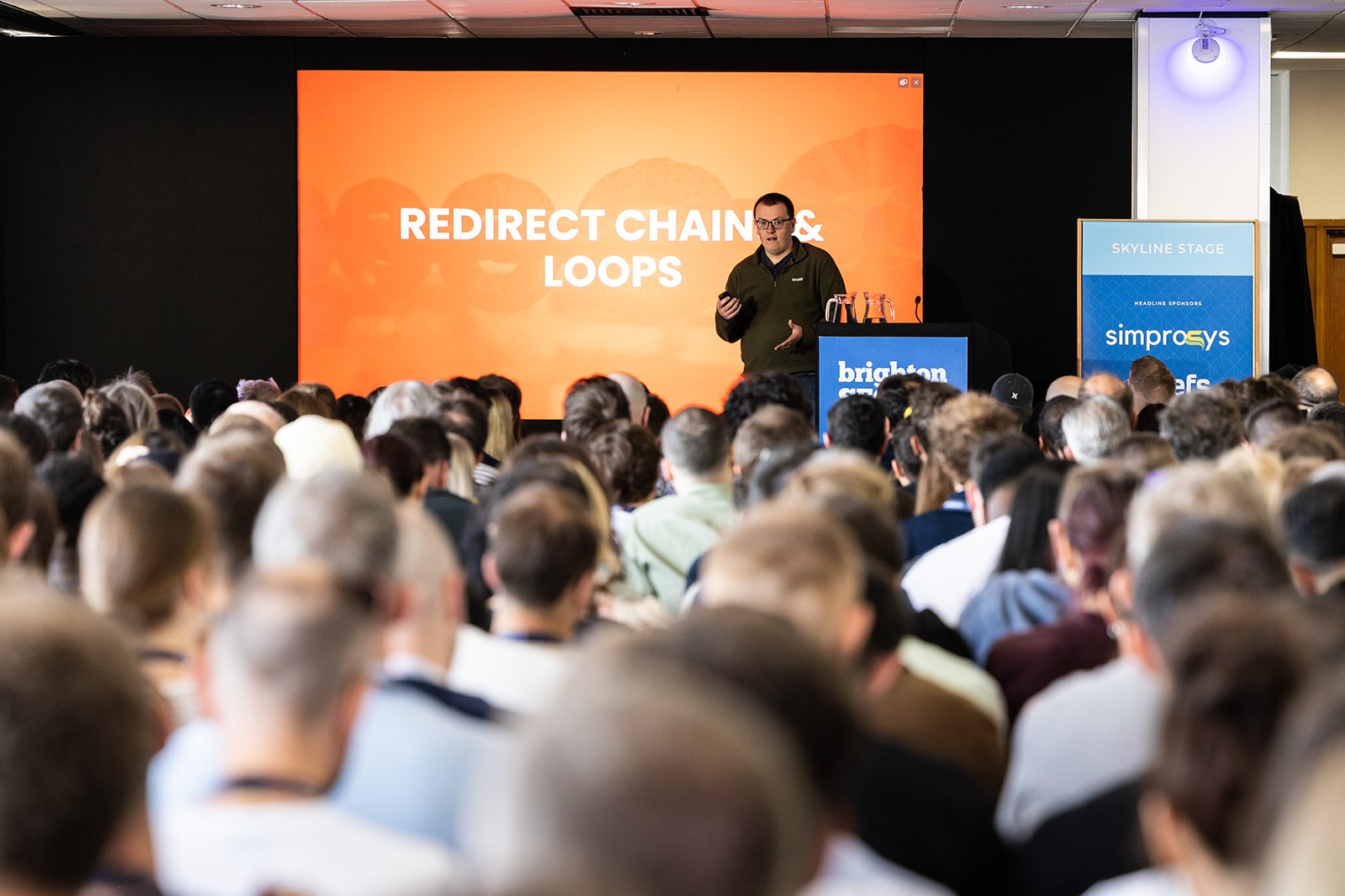 Jonathon speaking about redirect chains and loops at BrightonSEO